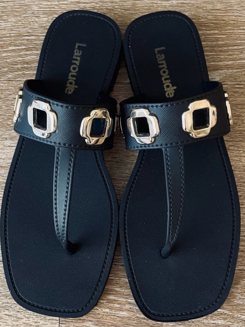 Larroudé Women’s Milan Grommet Jelly Thong Sandal distinctive gold-tone square 7